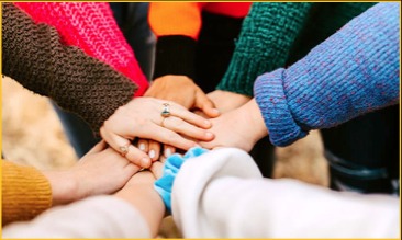Members joining hands in support